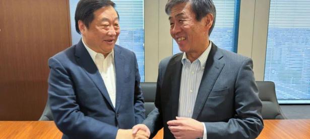 谭旭光与日本五十铃社长片山正则座谈交流